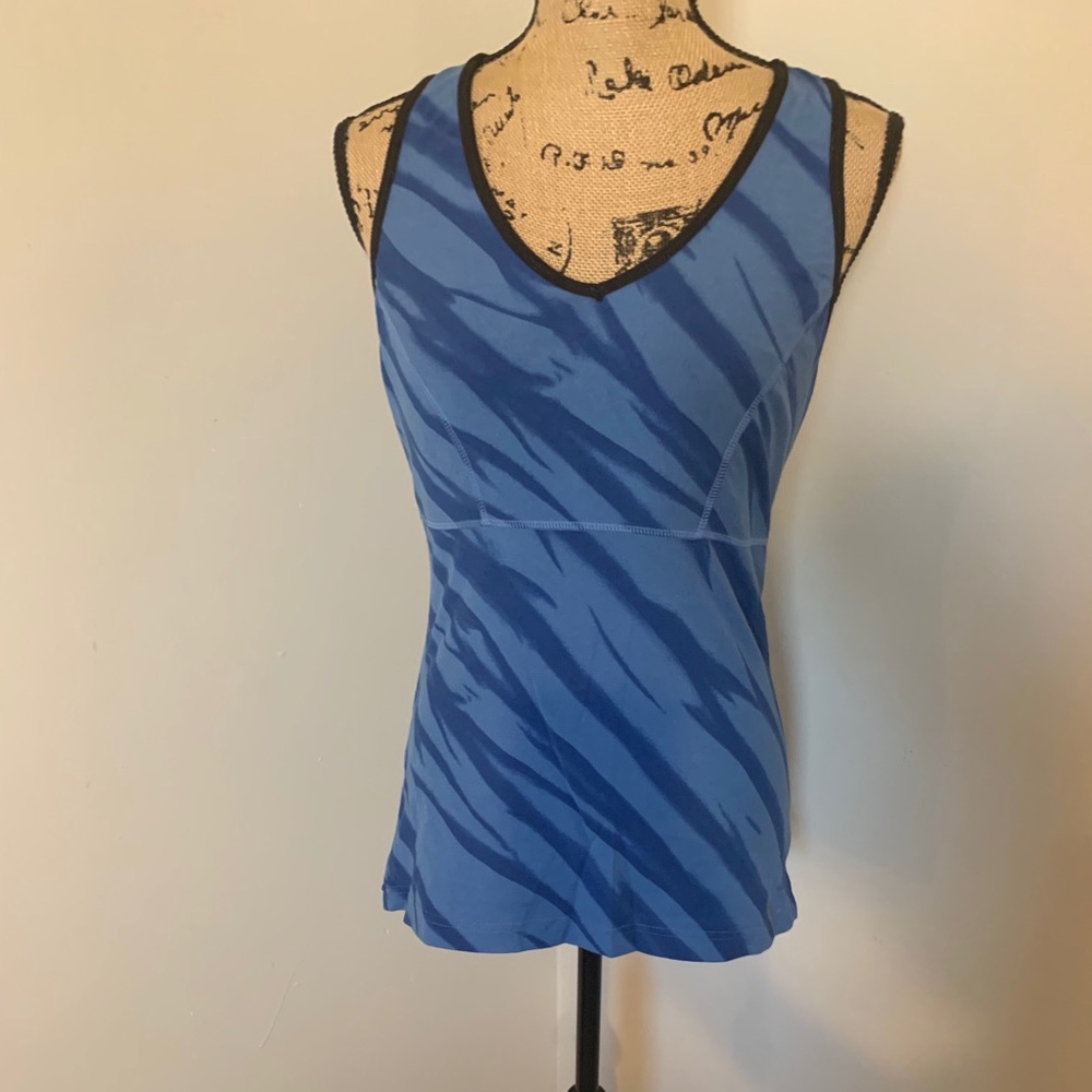 Marika blue w/black trim muscle tee. Size XL